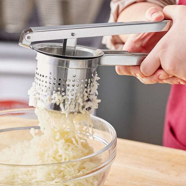 Potato strainer outlet masher